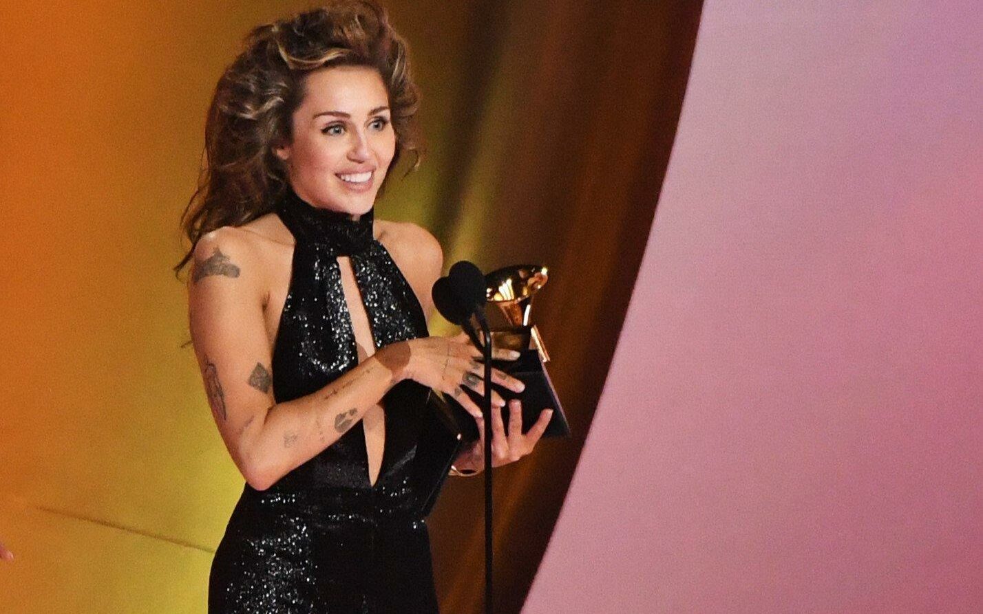 Miley Cyrus recieving award